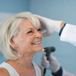 Woman in an ear exam